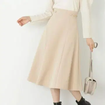 PROPORTION BODY DRESSING 체인탭 플레어 스커트