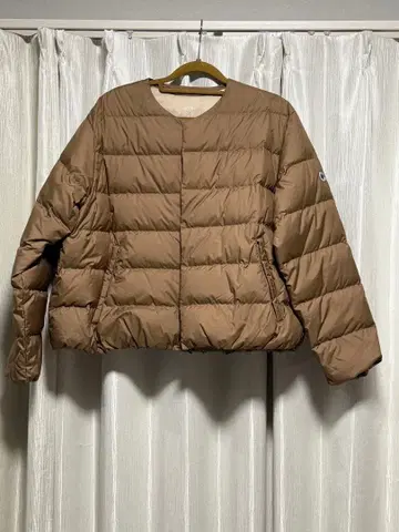 오르치발 라운드넥 다운 자켓