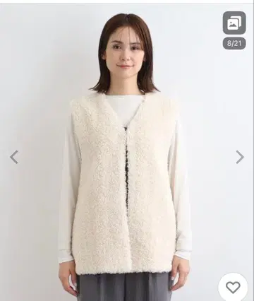 INDIVI 아이보리 인조 모피 베스트