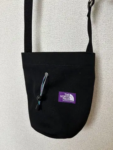 The northface 숄더백 퍼플 라벨