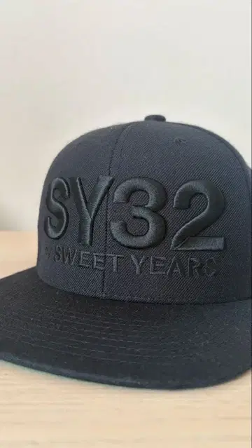 SY32 스냅백 캡 블랙/그린