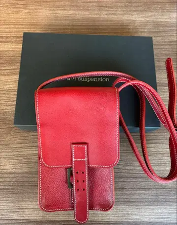 tr4 서스펜션 숄더백