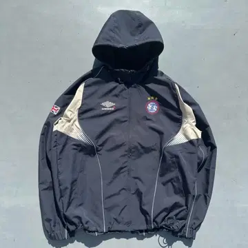9090 umbro Gradation Nylon Hooded Jacket