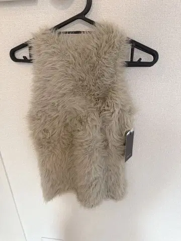 완판템 anuans 퍼라이크 슬리브리스 니트탑