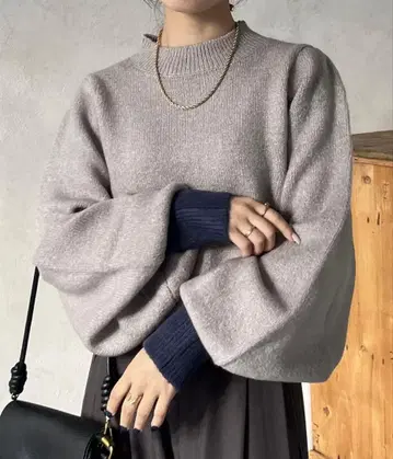 Thevon. 세본 바이컬러 볼륨 슬리브 니트