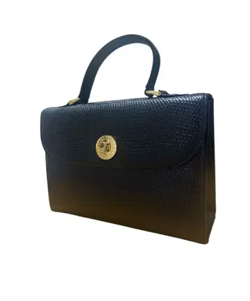 YUKI TORII 블랙 엠보 가죽 핸드백 골드 금장 장식 2way