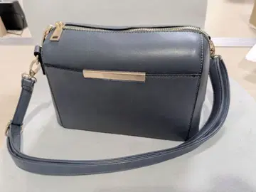 라운드 지퍼 미니 숄더백 브라운 모스 블루