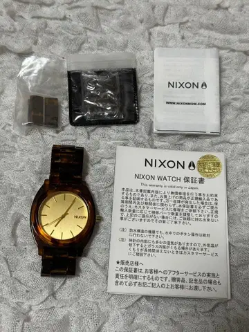 NIXON 아날로그 쿼츠 손목시계 브라운