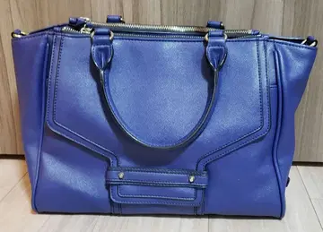 쿠 드 샹스 합성 피혁 핸드백 블루