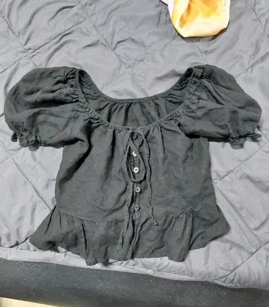 Black puff short-sleeve blouse