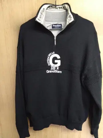 맨싱웨어의 GrandSlam 블랙 집업 스웨터