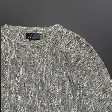 Unknown 3D knit sweater