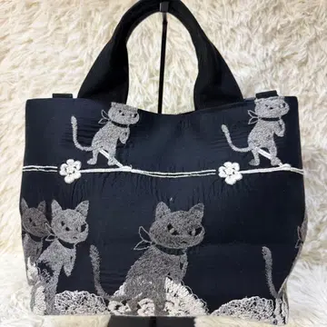 pjc 크로치 군 미나 페르호넨 토트백 블랙 꽃