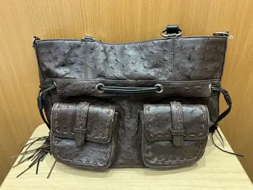 브라운 가죽 토트백 포켓 부착