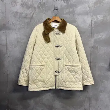 VEGA CHANG 퀼팅 파이어맨 자켓 금장 장식