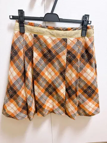 prideglide 오렌지 계열 체크 무늬 플레어 스커트