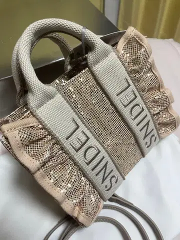 스나이델 프릴 로고 미니백