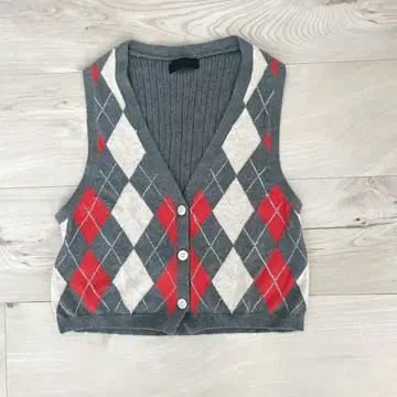 지나시스 베스트 리브 아가일 면 노스탤지어 니트 핏