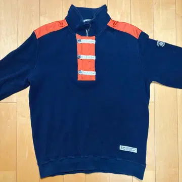 시나코바 넷 스웨터 하프 지퍼 네이비 쉘 버튼 오렌지