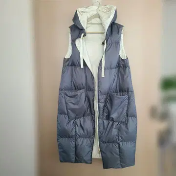 dinos so close 후드 부착 롱 다운 베스트