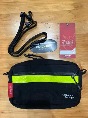 맨해튼 포티지 숄더백 사코슈 블랙/옐로우 그린 2020