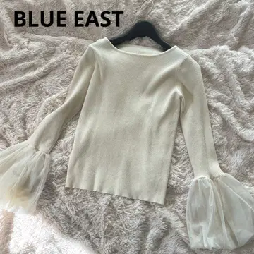 BLUE EAST 아이보리 플레어 슬리브 니트