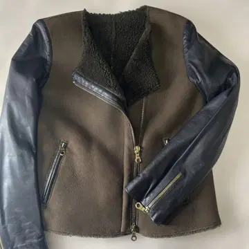 [새상품급] CINQUANTA 무스탕 절개 라이더 자켓 카키 블랙