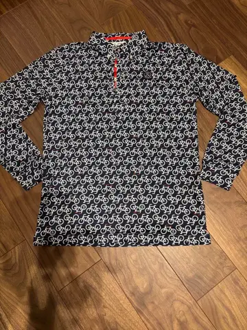 and per se 자전거 패턴 하프 지퍼 셔츠