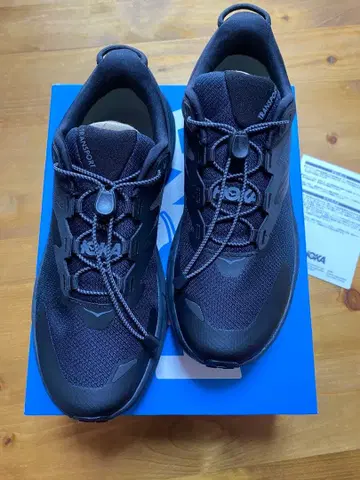 호카 트랜스포트 24.5 블랙 / 와이드