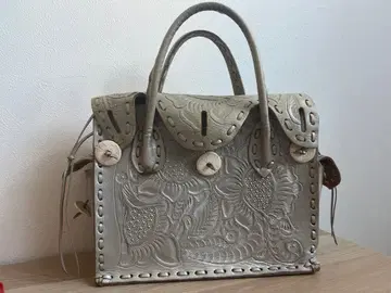 엠보싱 가공 가죽 핸드백 그레이