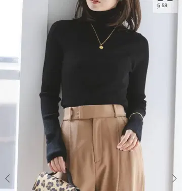 리브 터틀넥 니트 블랙