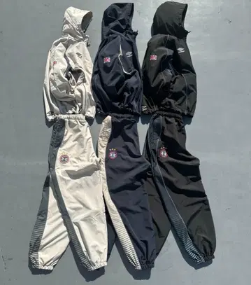 9090 umbro Gradation Nylon Hooded Jacket