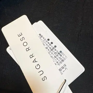 세븐페어리 SUGAR ROSE 블랙 니트 스웨터