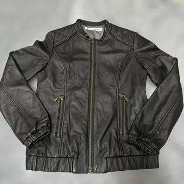 RACY RADIANT 블랙 가죽 자켓