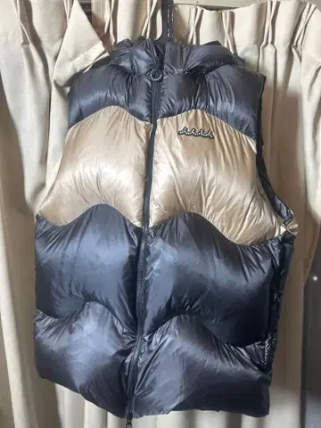 muta 무타 웨이브 퀼트 다운 베스트