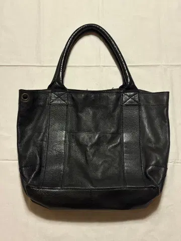 Cours de Couleur 블랙 가죽 토트백