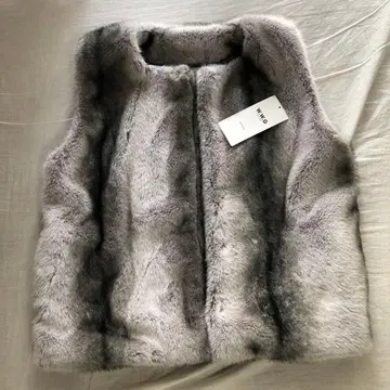 W.W.G 볼륨 퍼 베스트