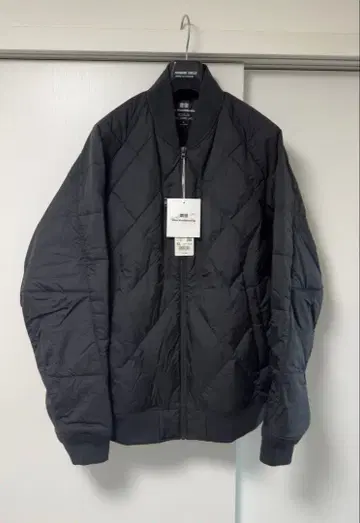 UNIQLO 화이트 마운티니어링 리사이클 하이브리드 다운 자켓