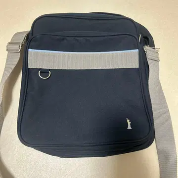 EAST BOY (이스트 보이)의 스카이블루 숄더 스쿨백