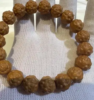 원숭이 머리 조각 양 팔찌