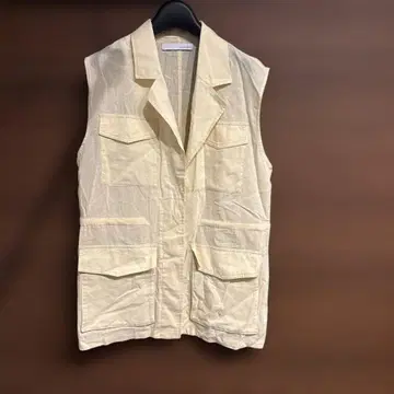 CLOCHE 크림색 슬리브리스 베스트