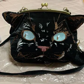 고양이 얼굴 벨벳 파우치