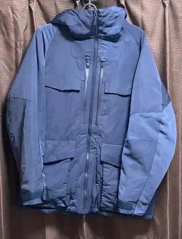 화이트 마운티니어링 x 유니클로 하이브리드 다운 오버사이즈 파카