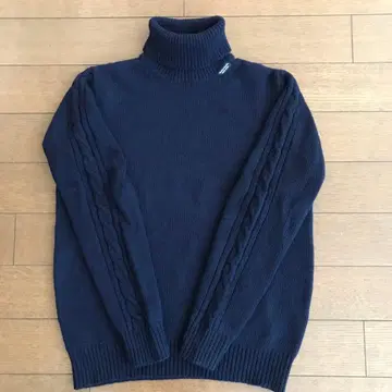 마드모아젤 논논 터틀넥 스웨터 네이비
