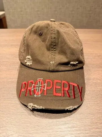 PROPERTY 데미지 가공 브라운 캡 M