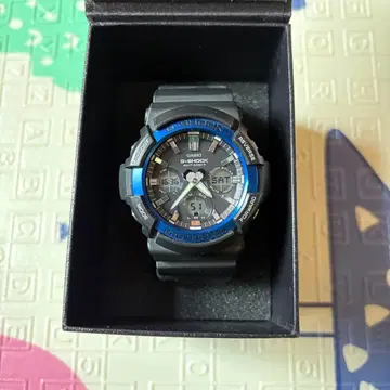 G-SHOCK GAW-100B 블랙/블루 전파 솔라