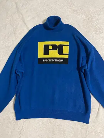 라스베트 PACCBET 파랑 터틀넥 스웨터 로고