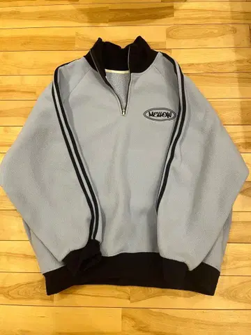 MELLOW 하프 지퍼 플리스