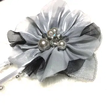 도쿄 소와르 코사지