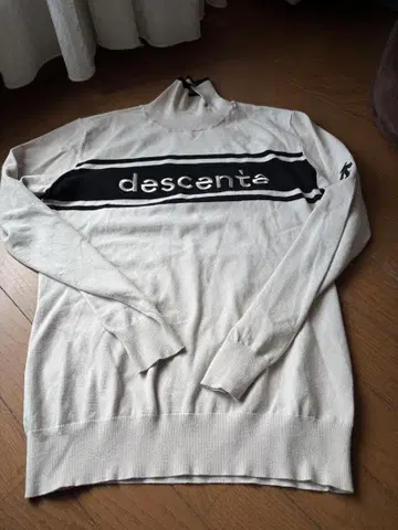 데상트 골프 니트